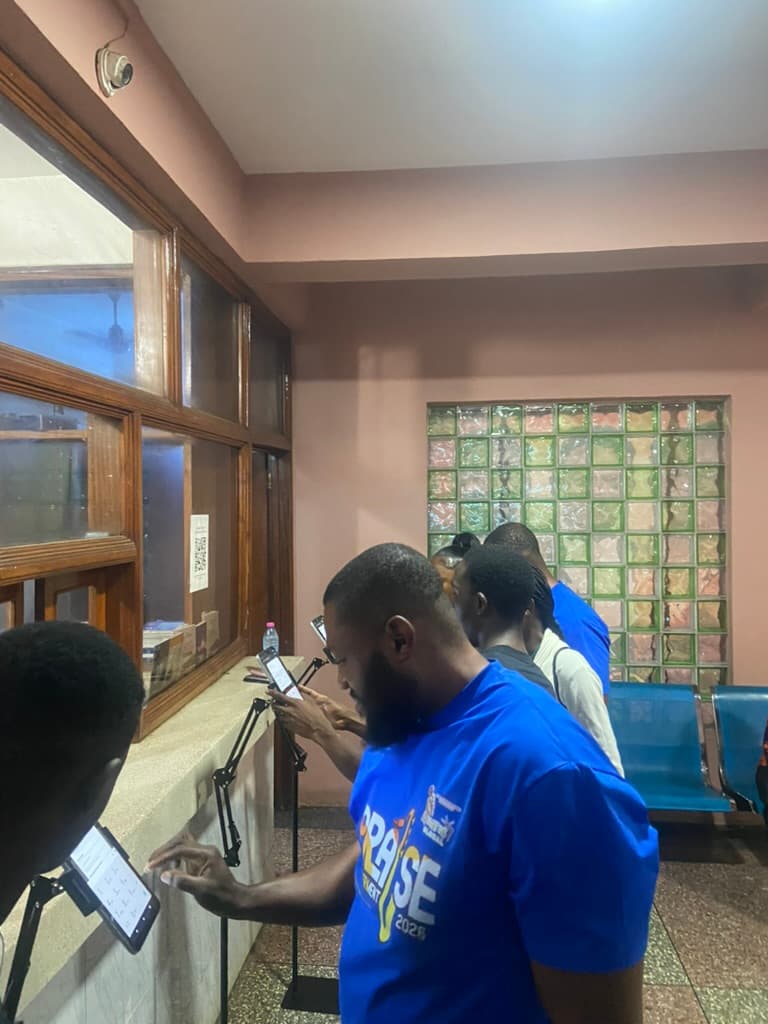 A team member helping with event check-in